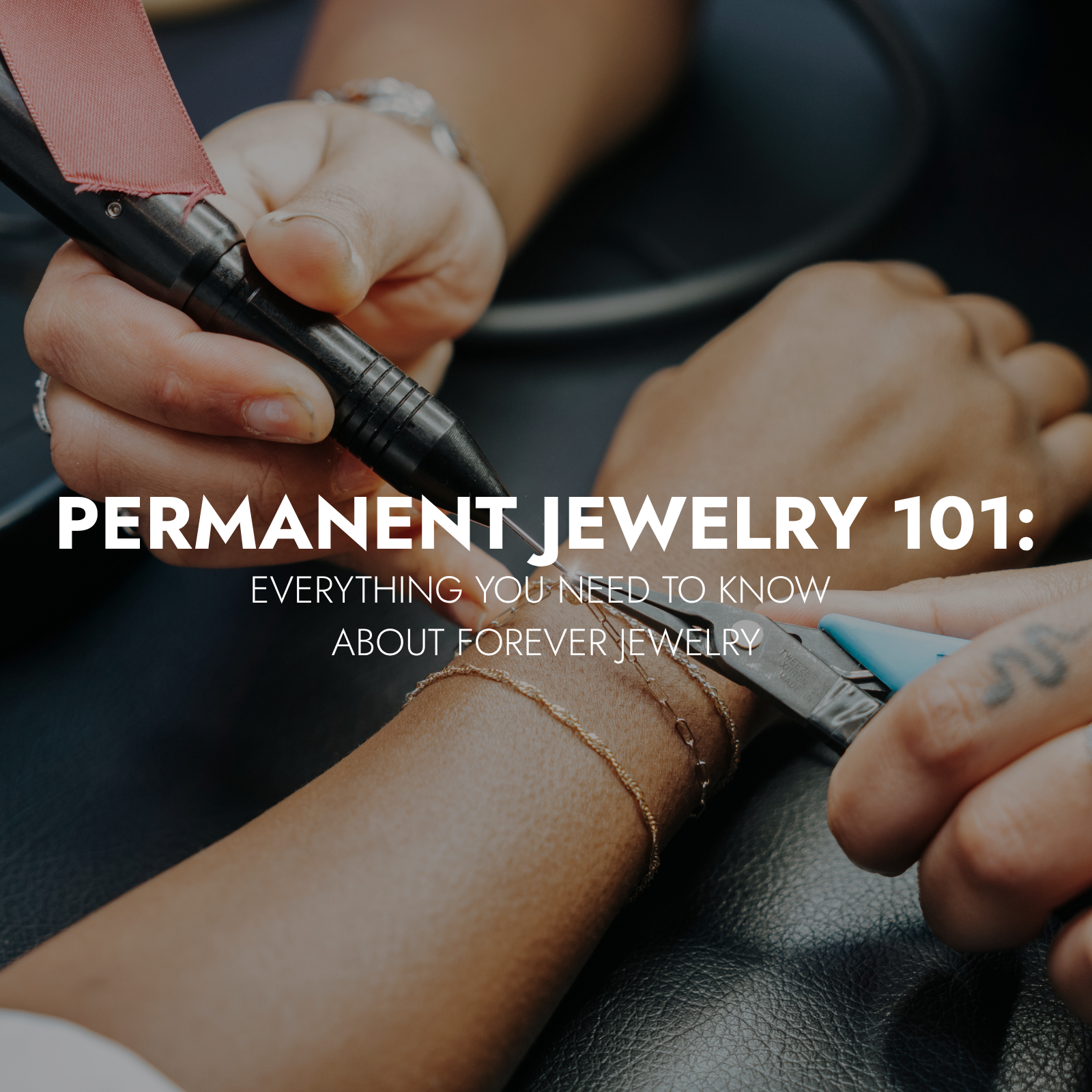 Brave Daughters jeweler welding a 14k gold permanent bracelet on a client’s wrist during a Forever Jewelry appointment.