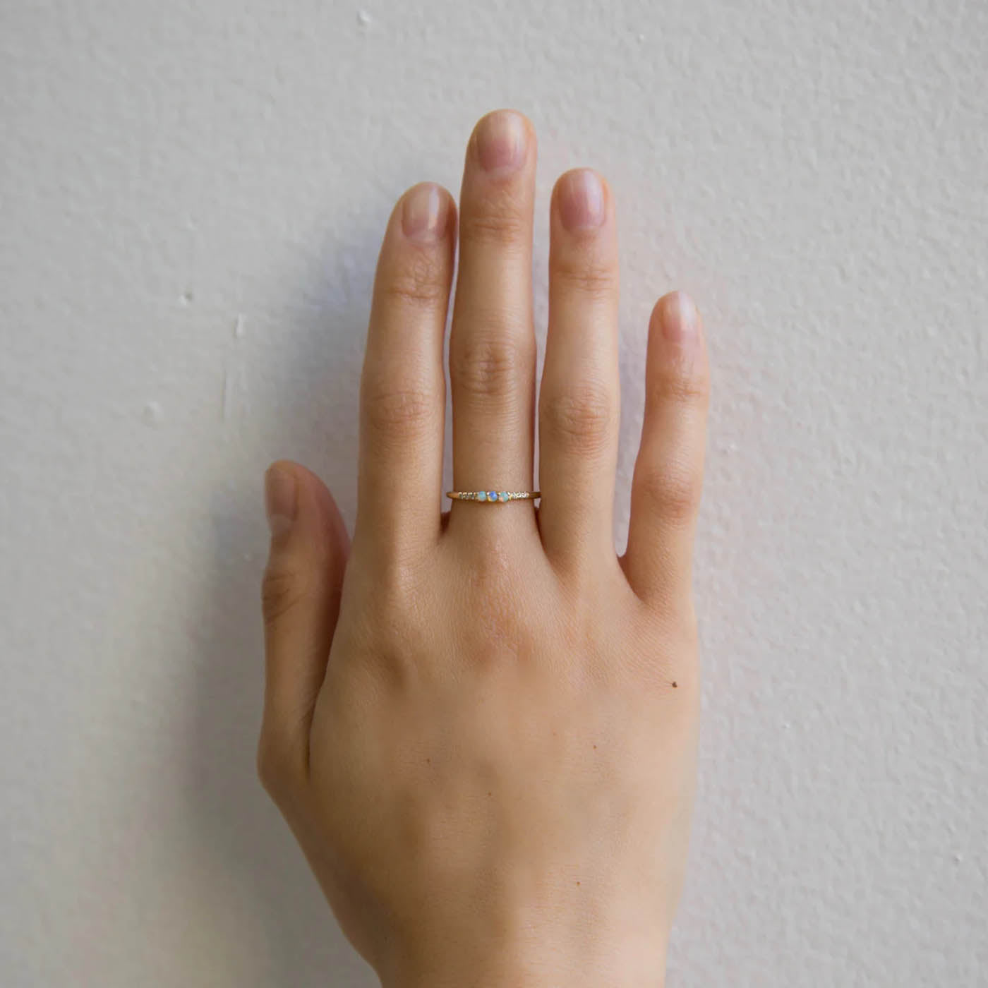 14K Yellow Band with Opals and Diamonds on a Hand