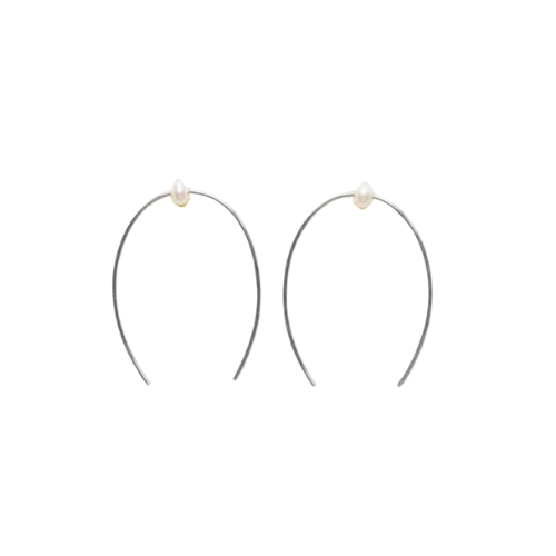 Large Pearl Threader earrings featuring delicate silver hoops and elegant pearls, handcrafted by Brave Daughters, emphasizing quality and style.