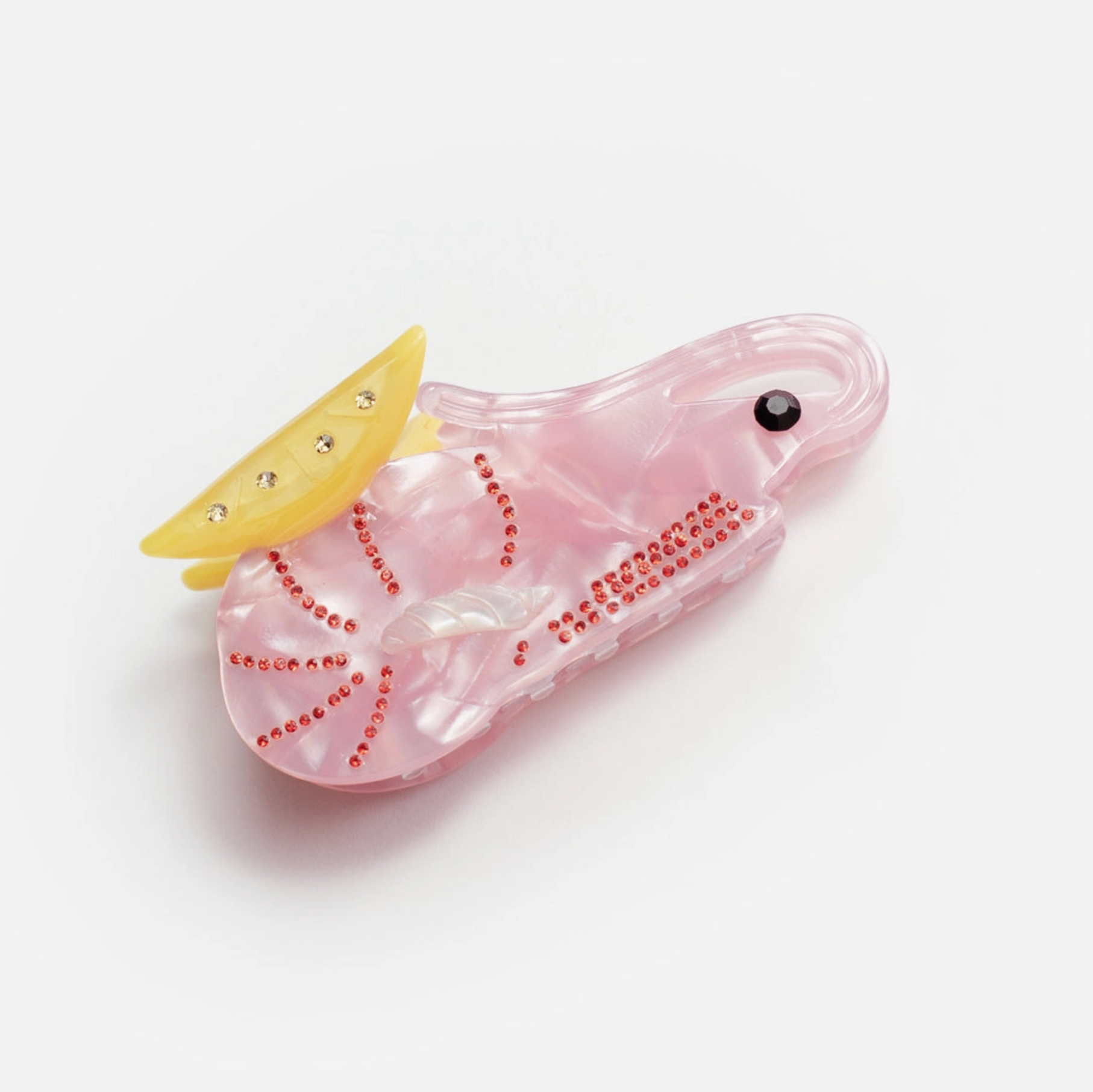 Cajun Shrimp Claw hair accessory featuring a pink shrimp design with yellow lemon slice and decorative rhinestones, inspired by shrimp cocktail aesthetics.
