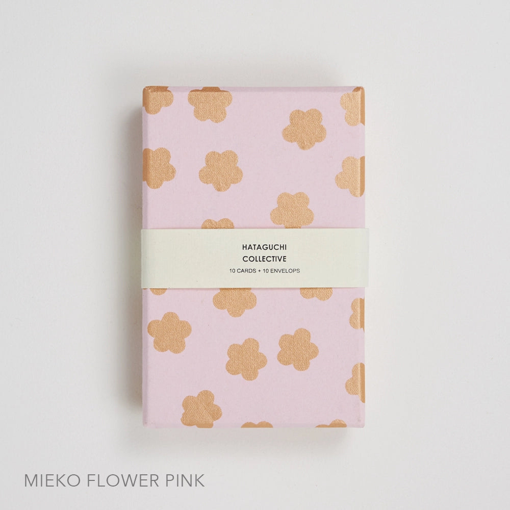 Pink Mieko Card and Envelope Set featuring hand screen-printed note cards with gold flower patterns, eco-friendly design by Hataguchi Collective, suitable for sustainable stationery enthusiasts.