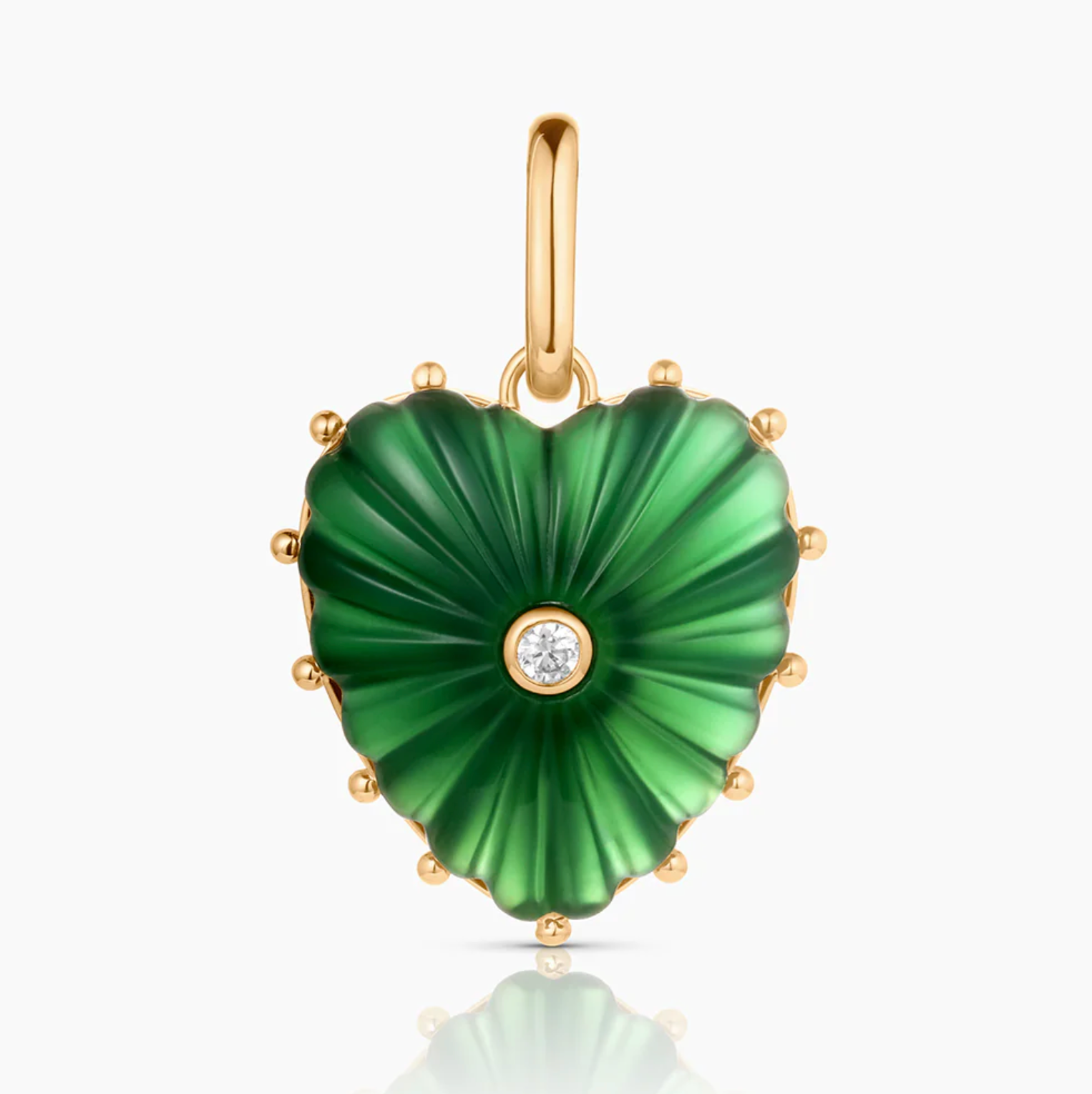 Heart-shaped green mother of pearl pendant with gold accents and cubic zirconia, featured in Brave Daughters' Malene Clip Necklace collection.