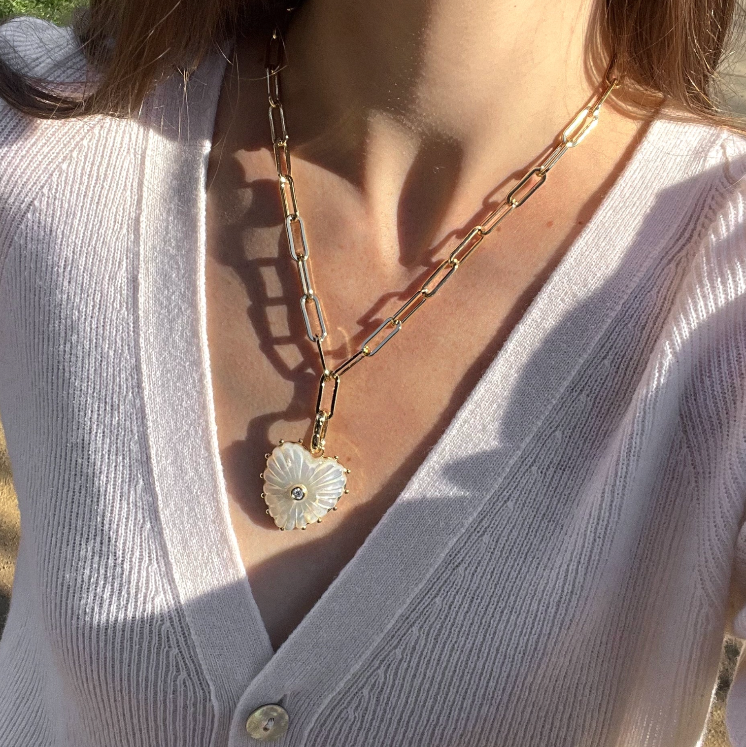 14k gold plated adjustable paperclip chain necklace with removable hand-carved mother of pearl and cubic zirconia Malene heart pendant, 6.5mm links, up to 18 inches.