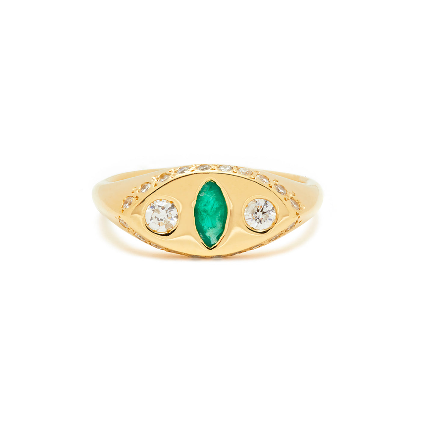 Emerald and diamond Makeda ring featuring a gold band and intricate design.