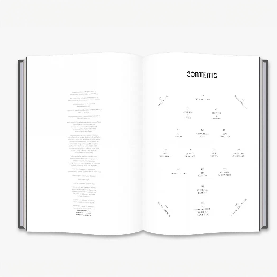 Open book displaying table of contents for 'The New Stone Age: Ideas and Inspiration for Living with Crystals', featuring sections on crystals, their uses, and historical insights.