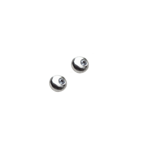 White sapphire stud earrings featuring a polished silver finish, highlighting the unique design of the Sunny Side Up collection by Brave Daughters.