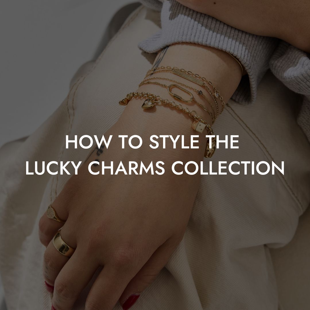 Layered Lucky Charms bracelets by Brave Daughters styled on wrist, showing how to wear and stack gold charm jewelry for everyday looks.