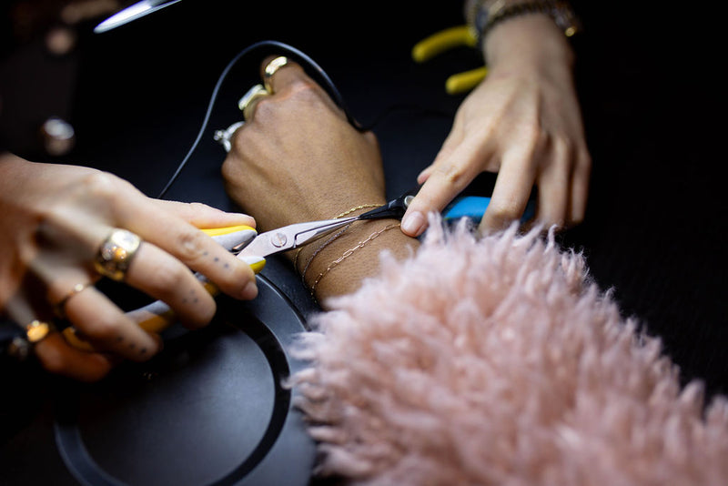 Bracelet welding during a Brave Daughters private event or pop-up — permanent jewelry crafted on-site for a one-of-a-kind fine jewelry experience.