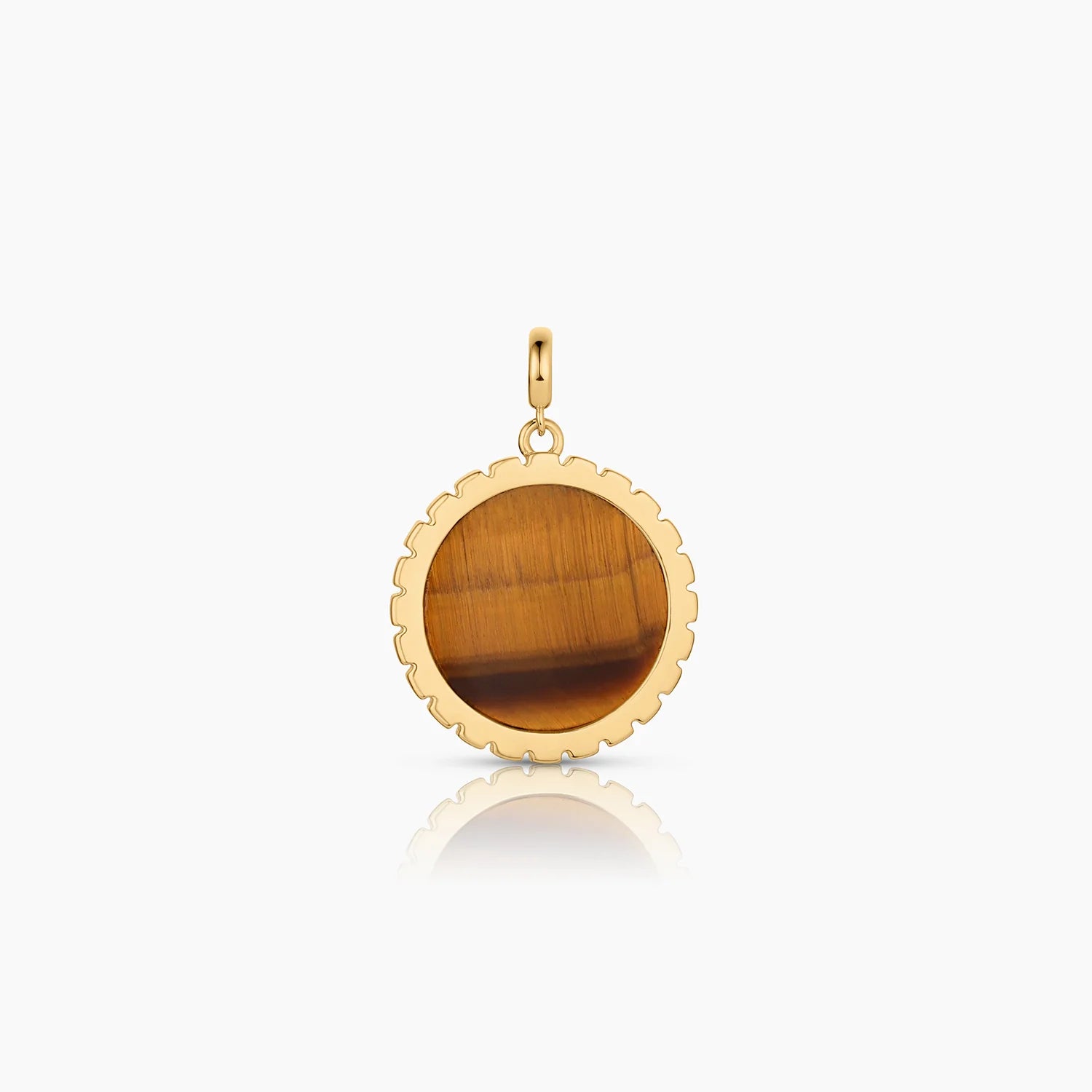 a circular gold charm with a circular inlay tigers eye stone of various brown tones over a white background