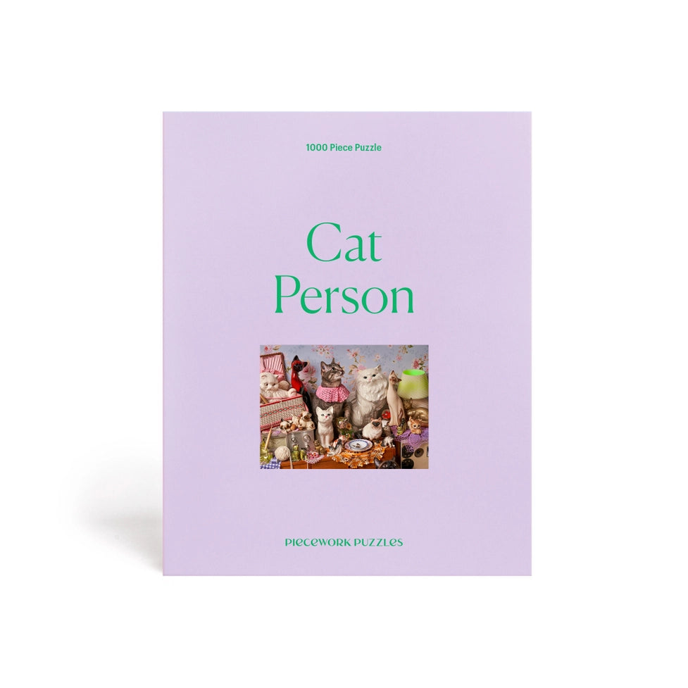 Puzzle box titled 'Cat Person' with images of cats on a light purple background