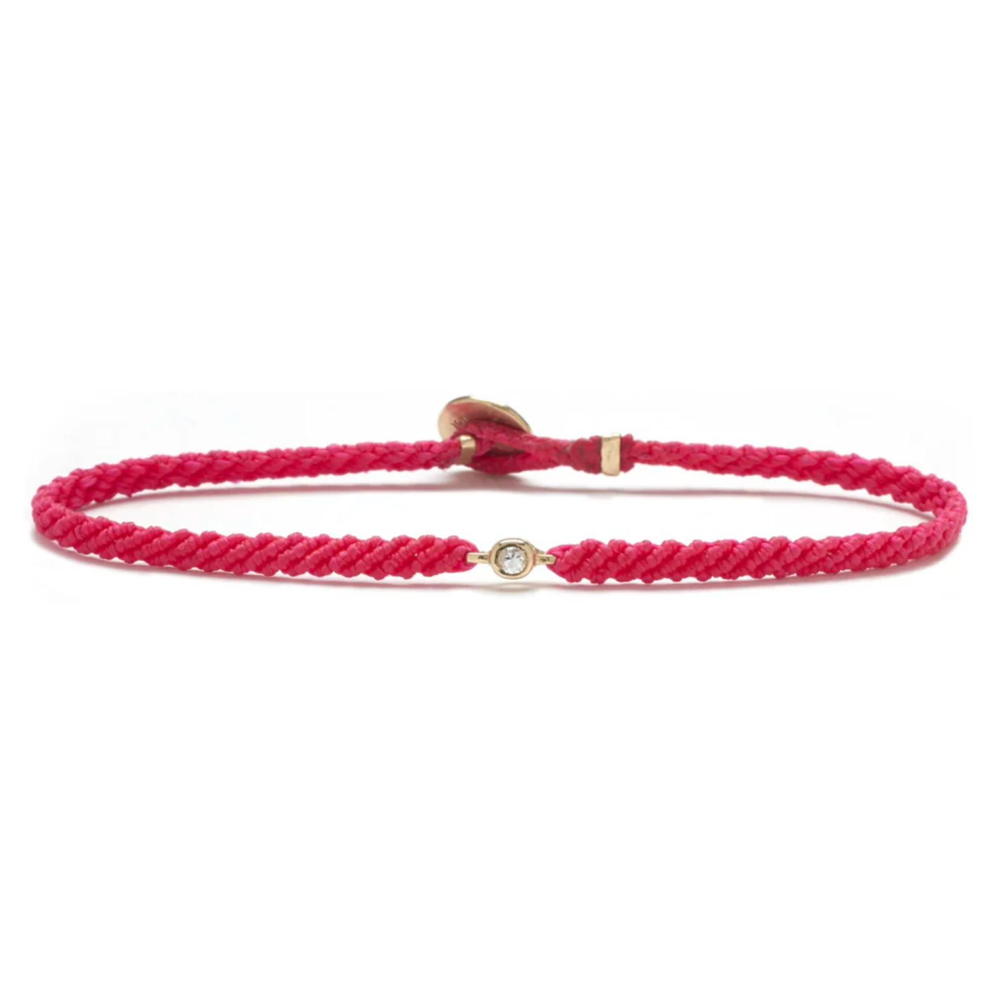 Pink braided bracelet with 10k gold bezel set diamond on a white background