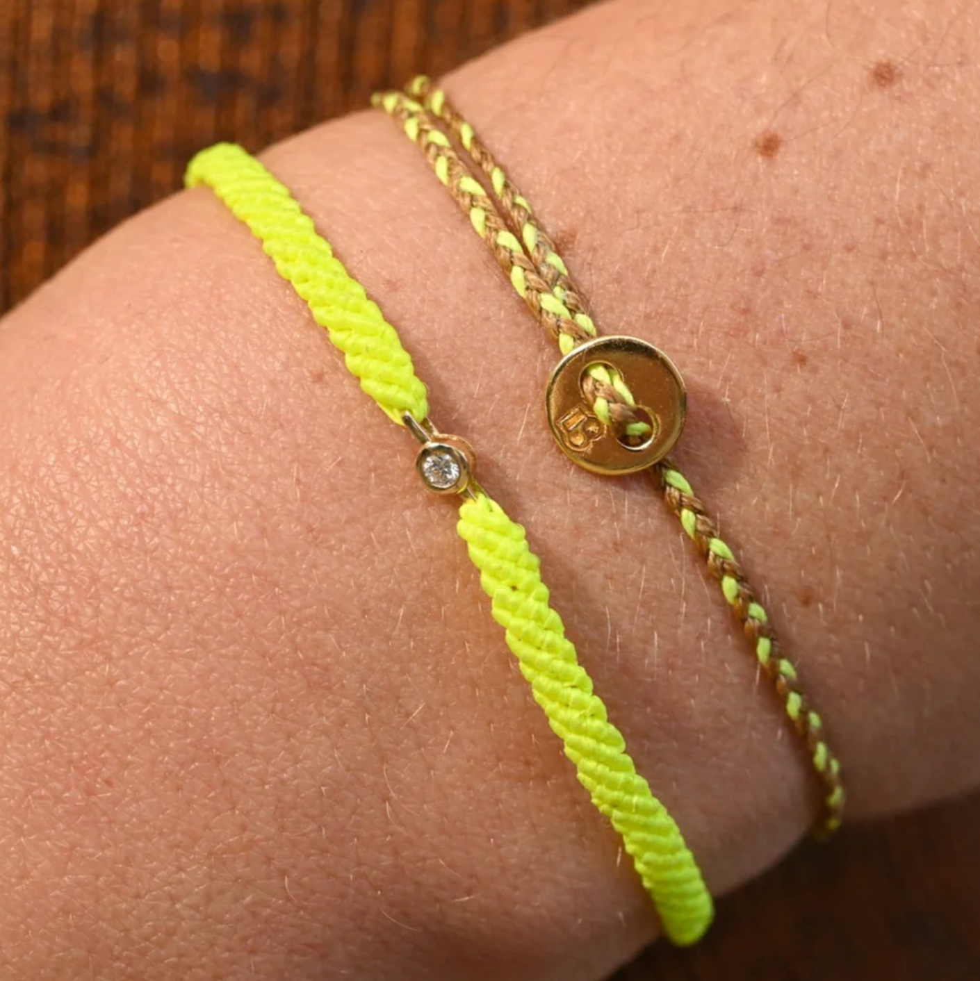 Neon green bracelet with a 10k gold bezel set diamond