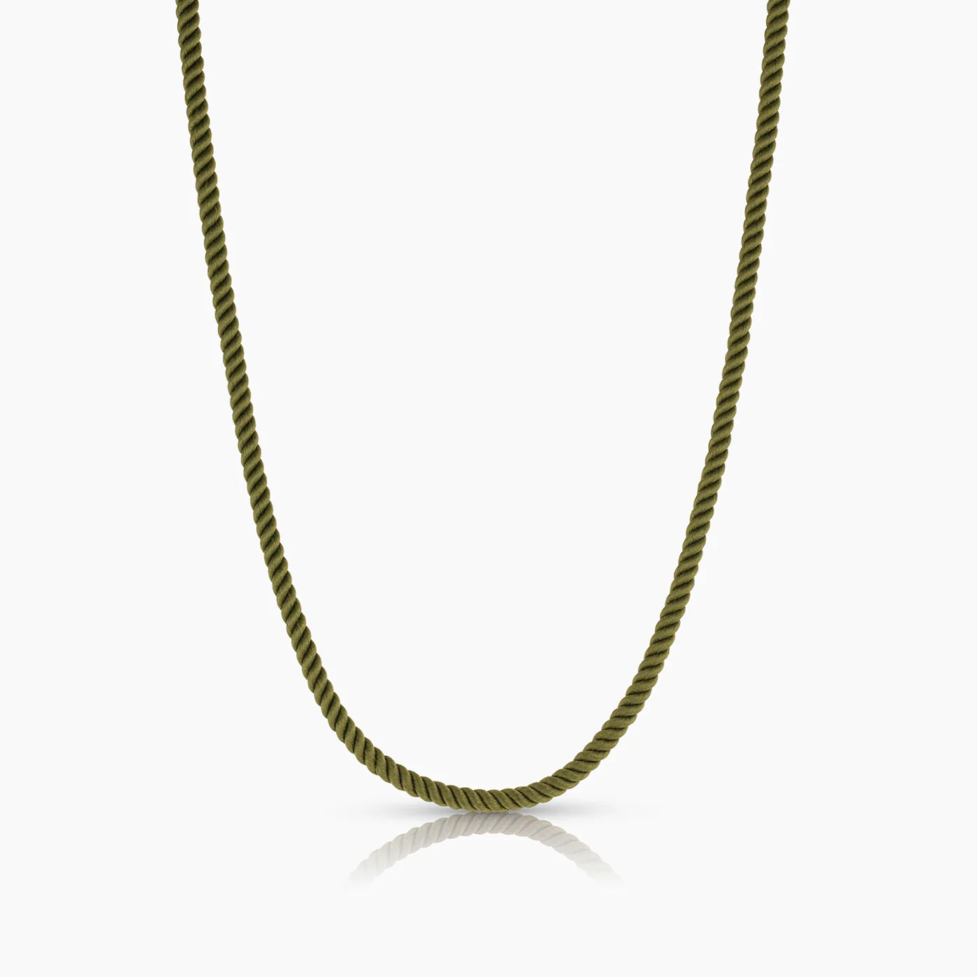 Green silk cord necklace on a white background