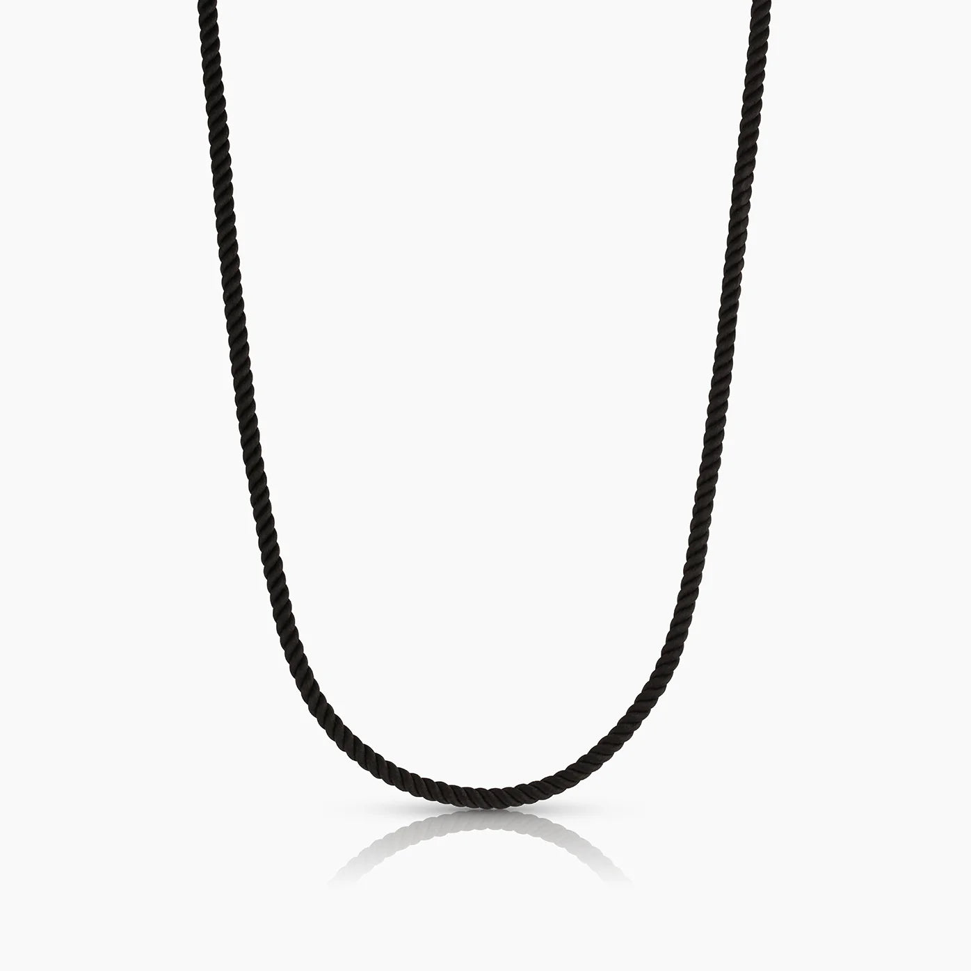 Black cord necklace on a white background