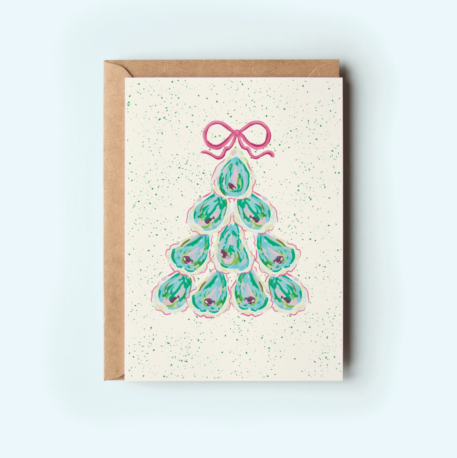 Oyster Inspired Christmas Tree Greeting Card on light background with kraft envelope