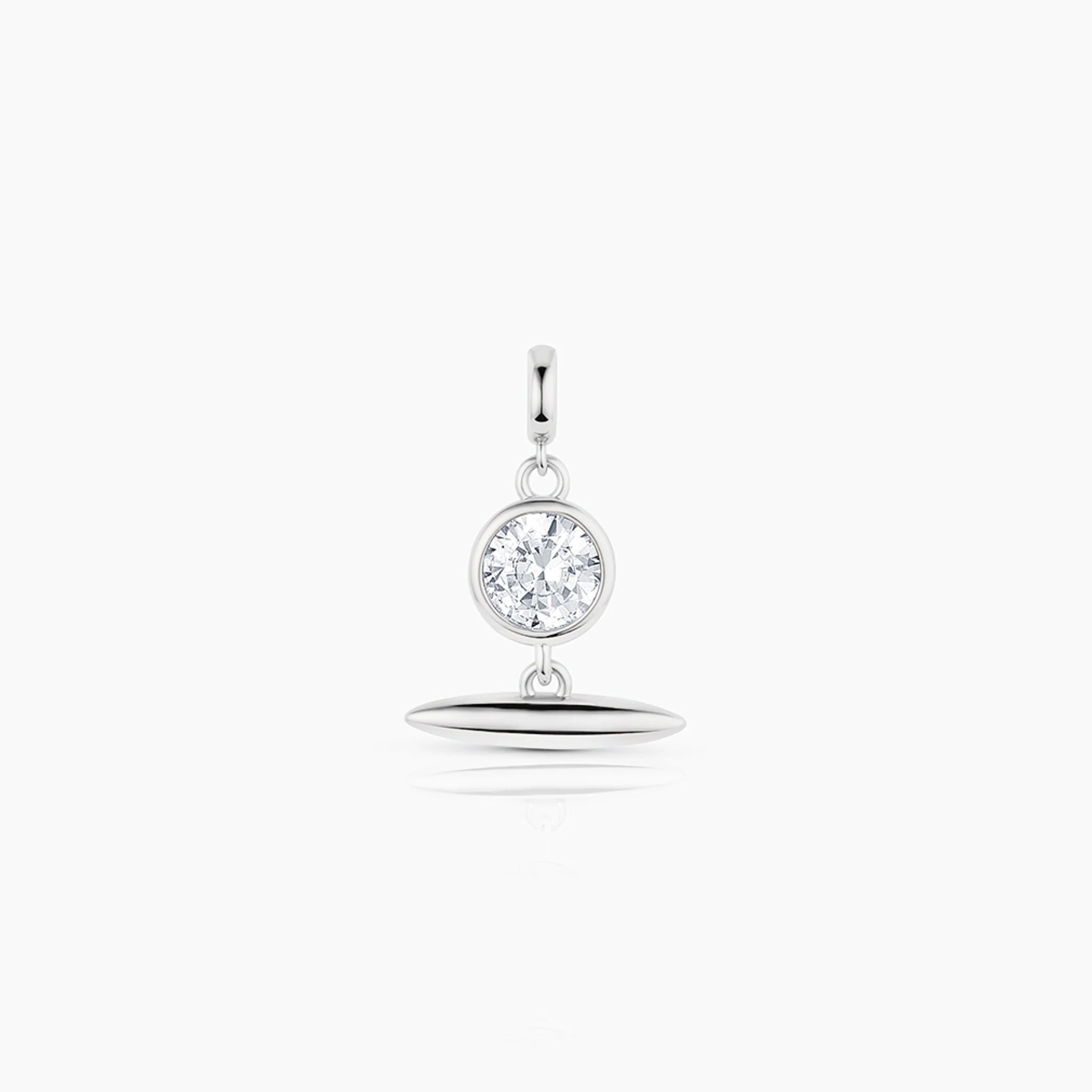 a silver charm with an bezel set cubic zirconia and a silver toggle attachment over a white background
