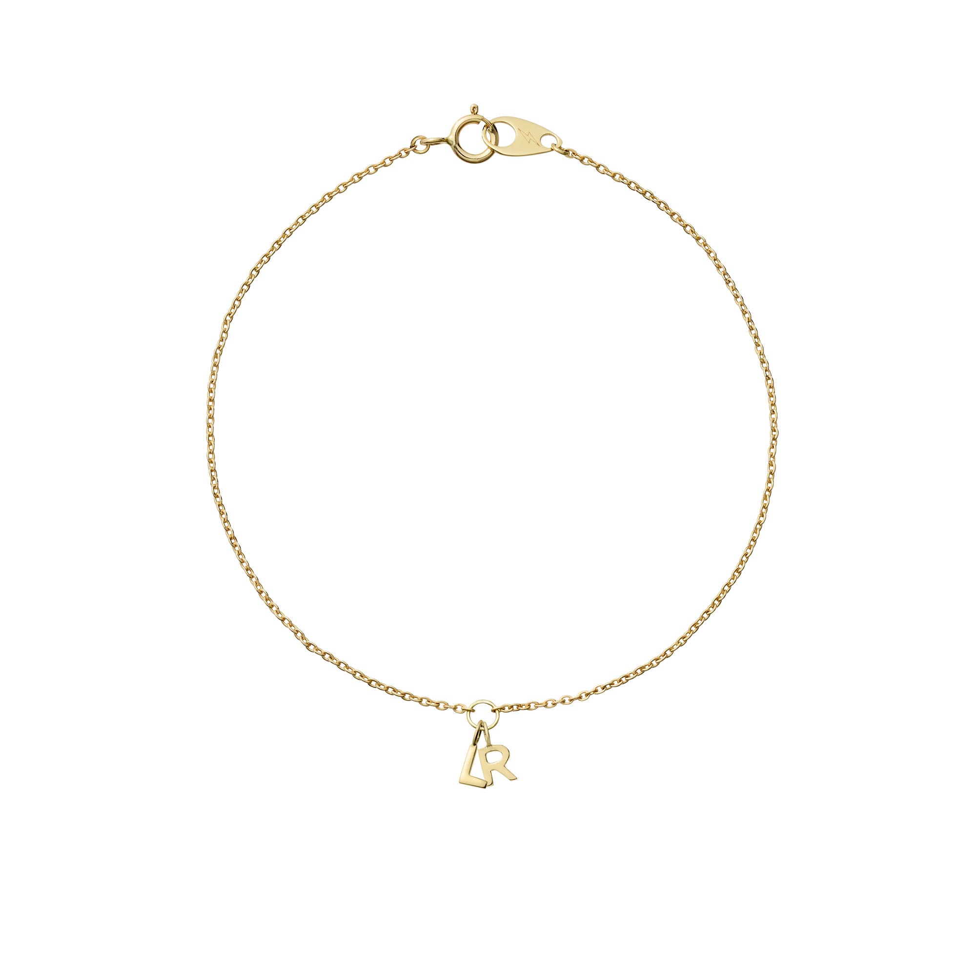 14k yellow gold mini cable bracelet with two initial charm on white background
