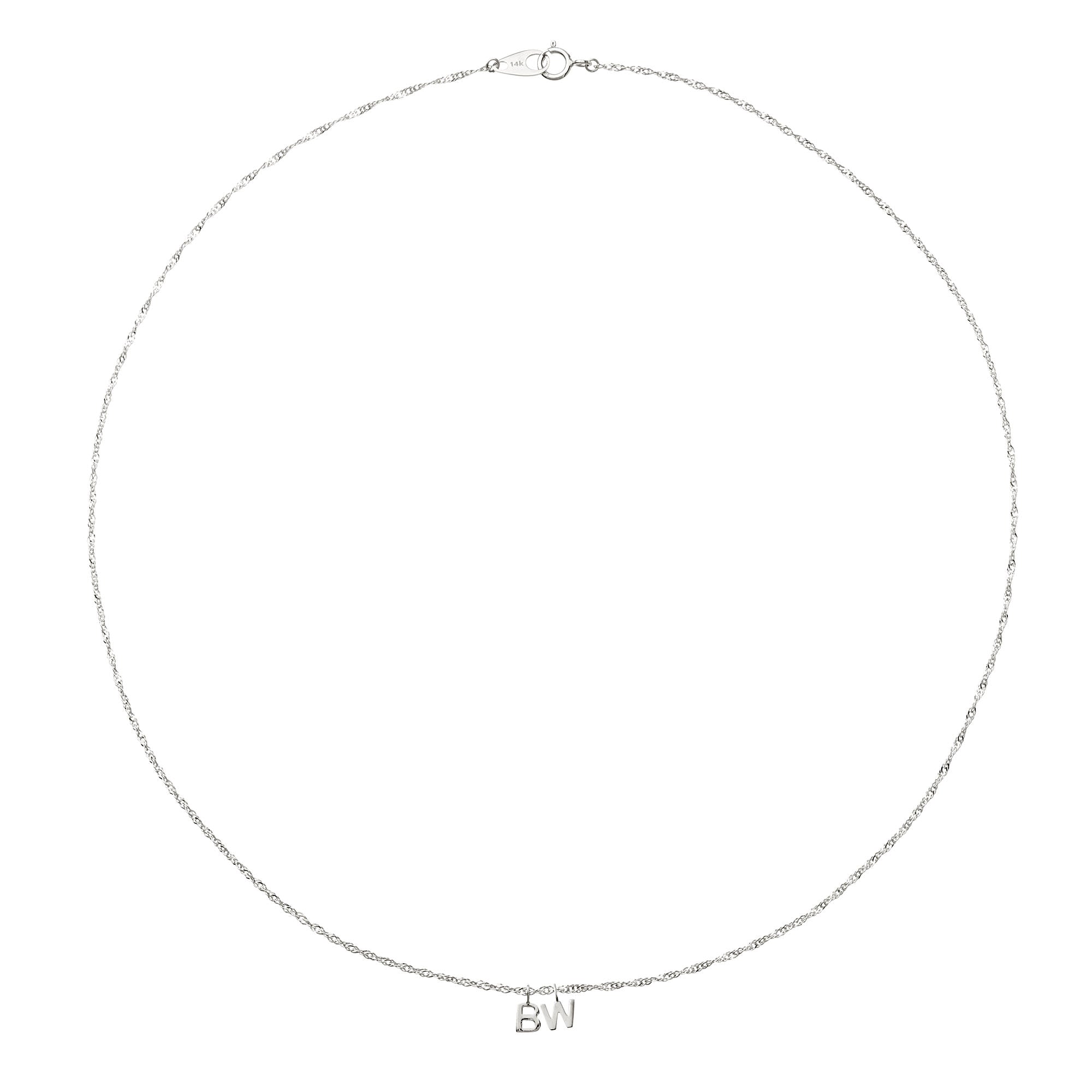 Silver necklace with 'BN' initials on a white background