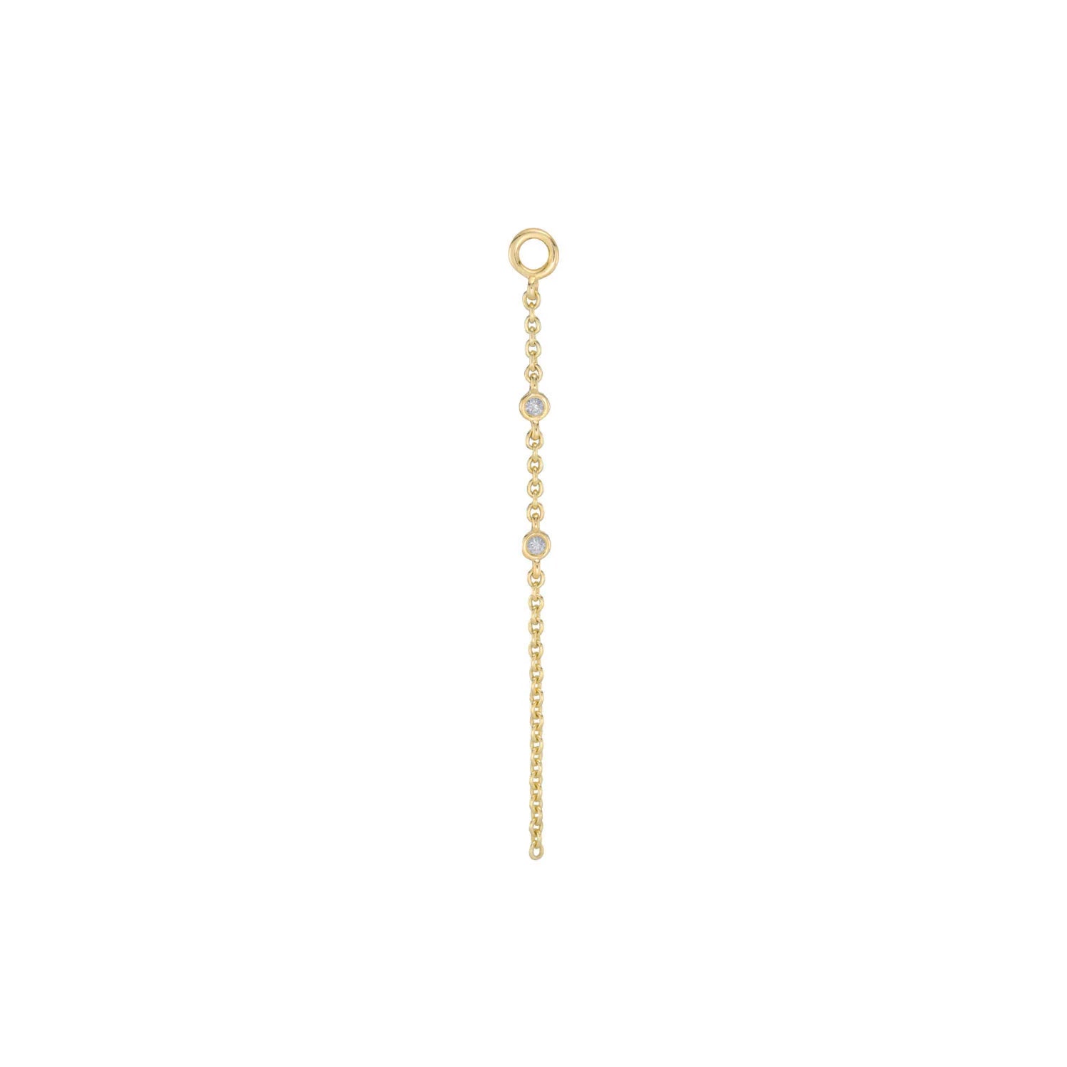 a gold chain charm with a gold jumpring and two bezel set white diamonds set on the chain drop over a white background