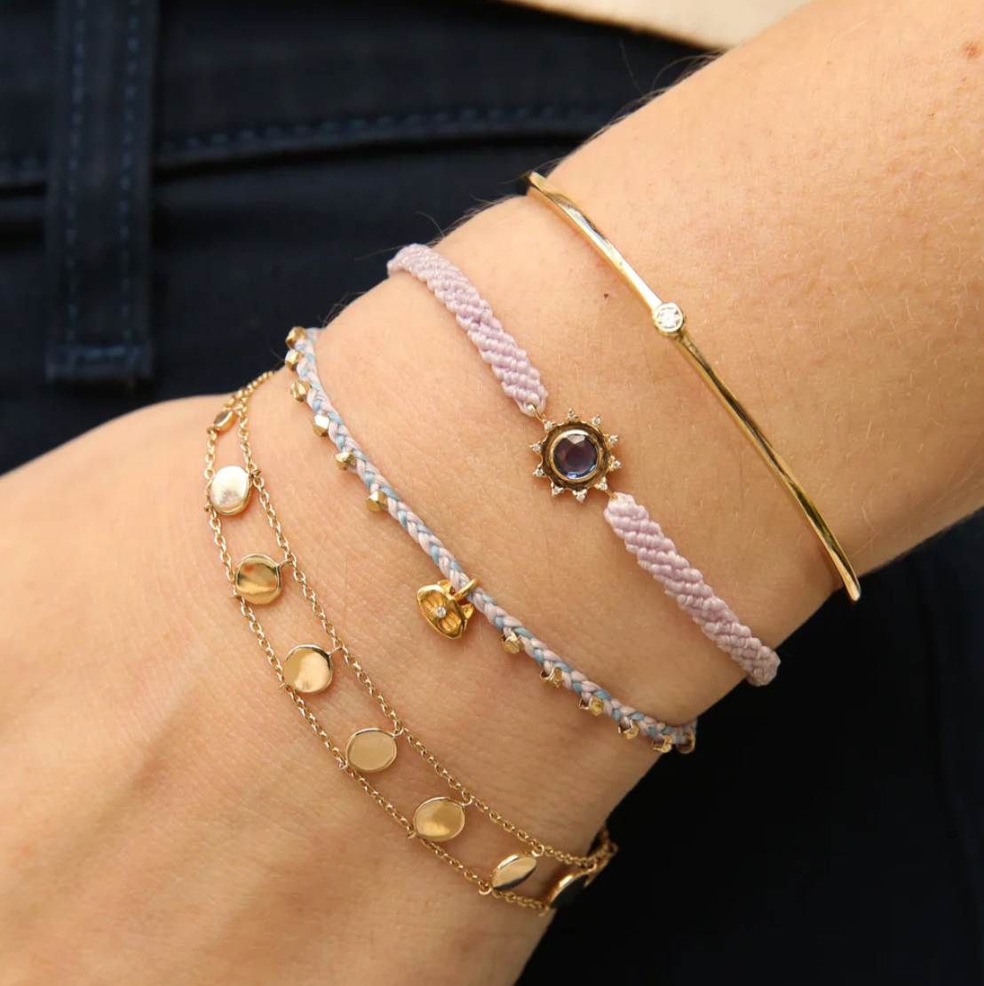 Bracelet with vermeil gold beads and a kitty charm with a button closure lavender and blue nylon cord