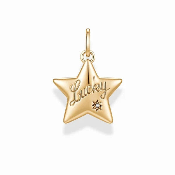 A gold star-shaped charm pendant engraved with the word 'Lucky' and a small clear stone, shown on a clean white background.