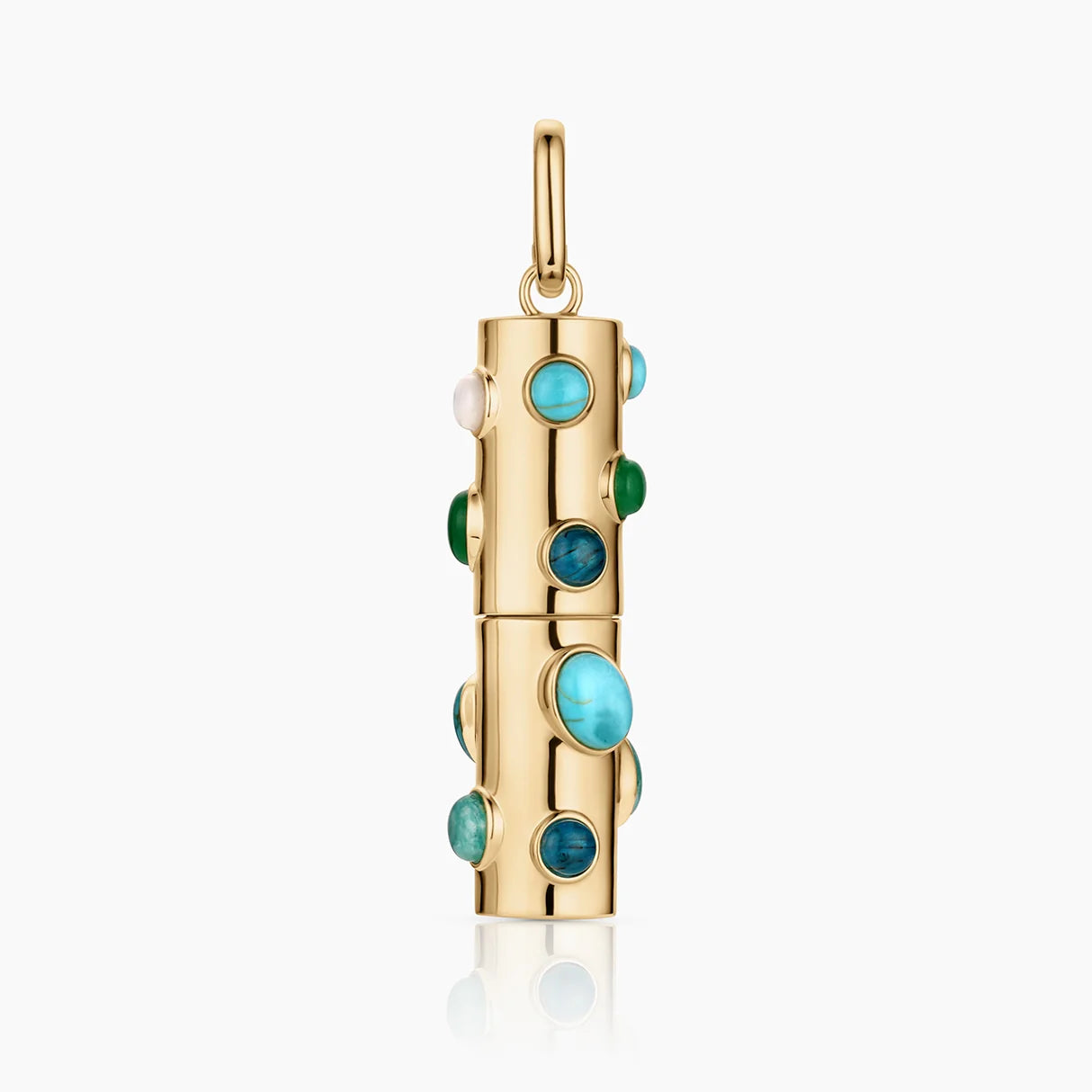 a gold charm with circular stones of various blues over a white background