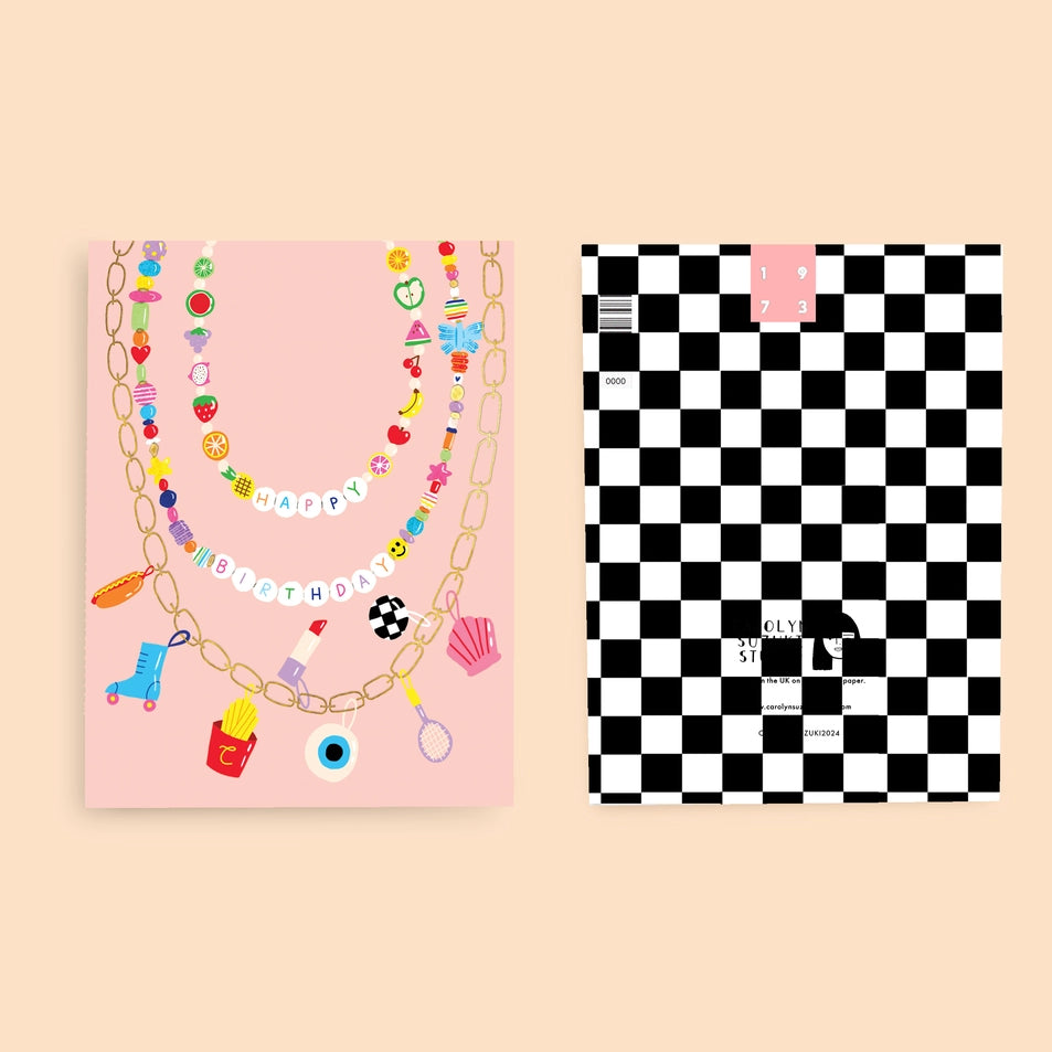 front and back of a a greeting card with a pink background and an illustration of a beaded charm necklace with assorted colorful beads and letter beads reading happy birthday