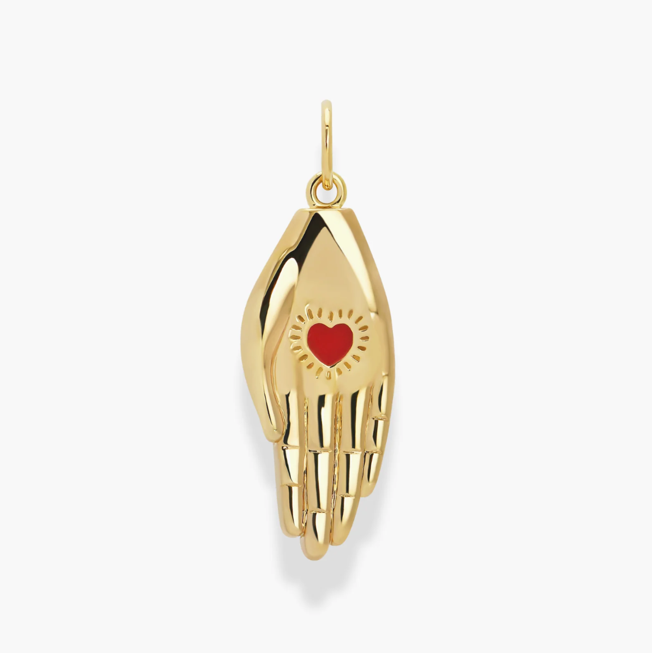 Small hand charm with red heart in the palm