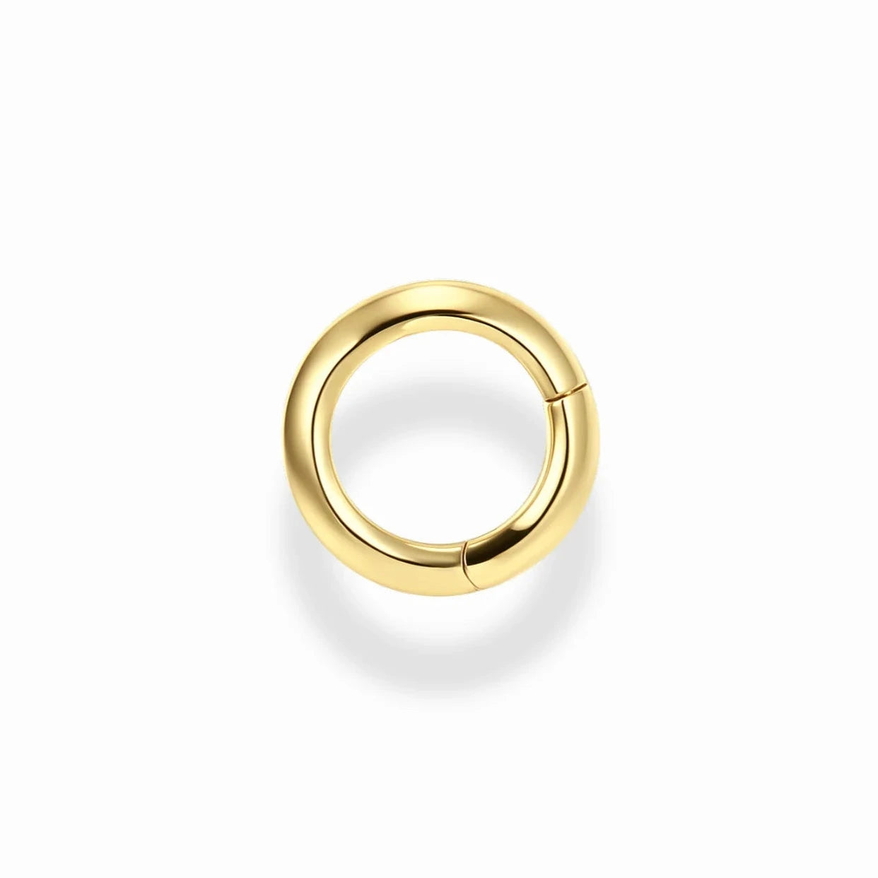 Gold ring on a white background