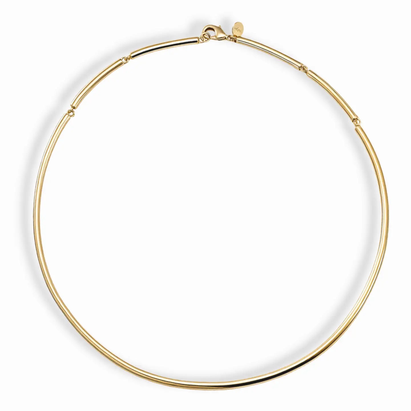 a gold necklace on a white background