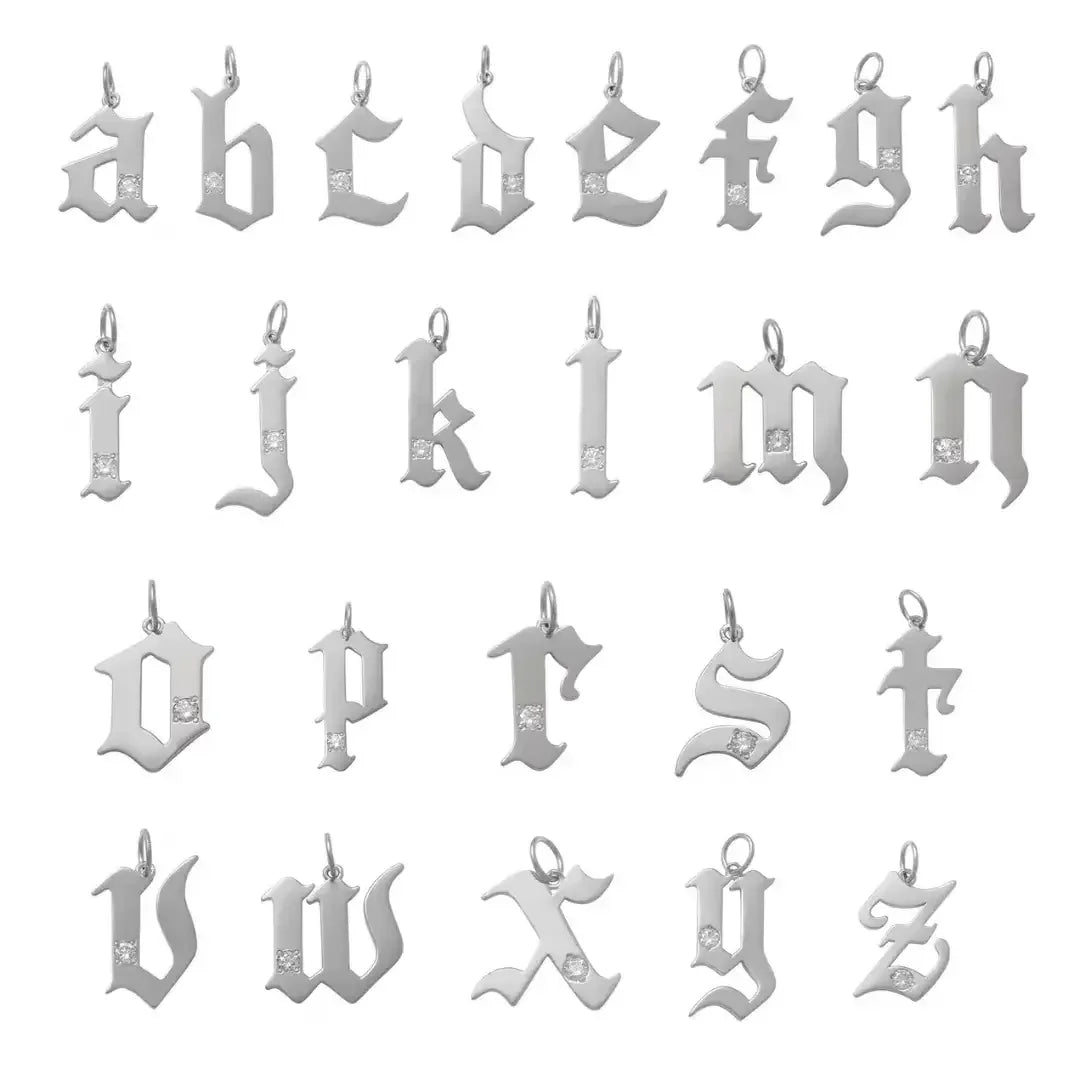 A set of silver gothic-style alphabet letter pendants arranged in a grid on a plain white background.