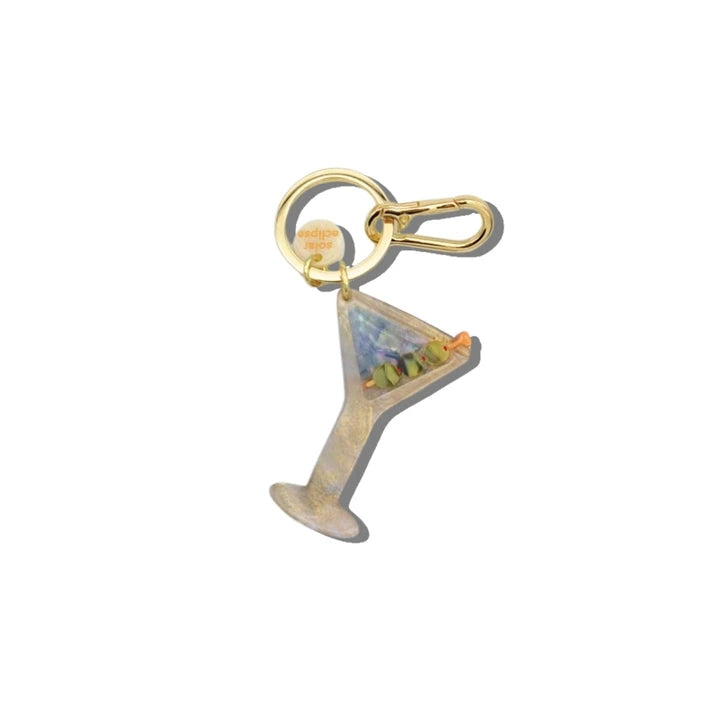 Gold martini glass keychain on a white background