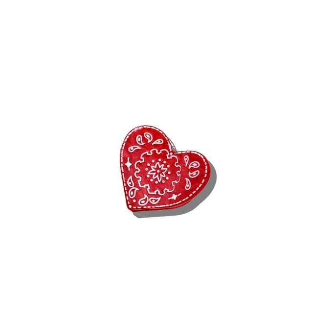 a red heart claw clip with a white paisley pattern on a white background