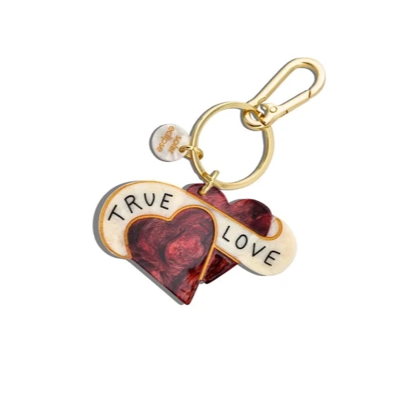 Heart-shaped keychain with 'True Love' text on a white background