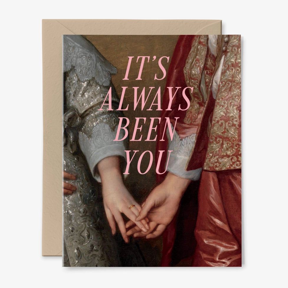 Greeting card with classical painting of hands holding a ring and text 'IT'S ALWAYS BEEN YOU' on a beige background.