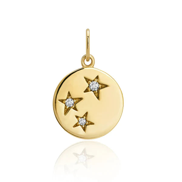 Gold pendant with three star designs on a white background