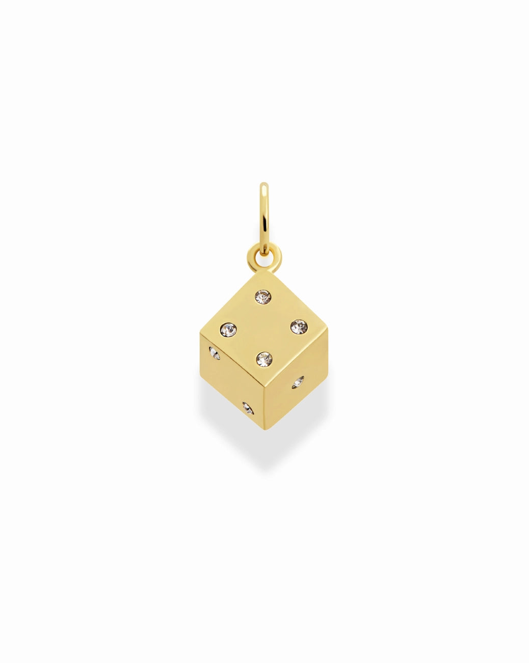 Gold dice-shaped pendant with embedded stones on a white background