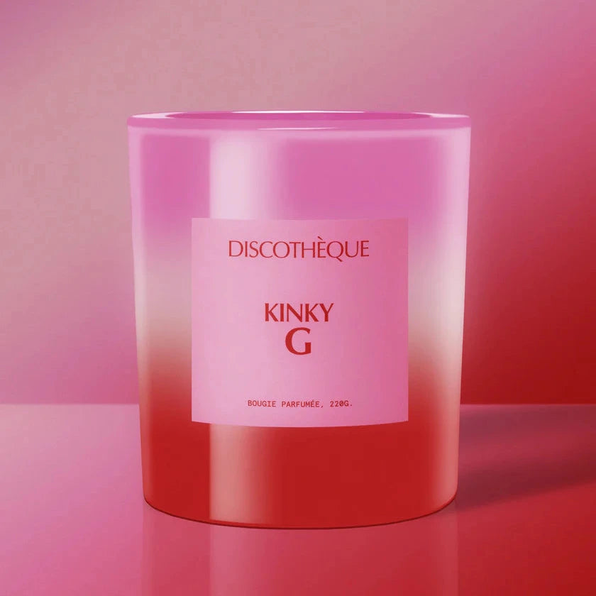 Pink and red gradient candle labeled 'Kinky G' on a matching pink background
