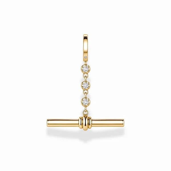 A gold-toned huggie hoop earring with a vertical drop featuring three small round-cut clear stones and a horizontal bar clasp, shown on a clean white background.