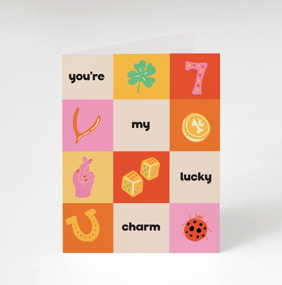 Colorful card with lucky charms and text on a light gray background