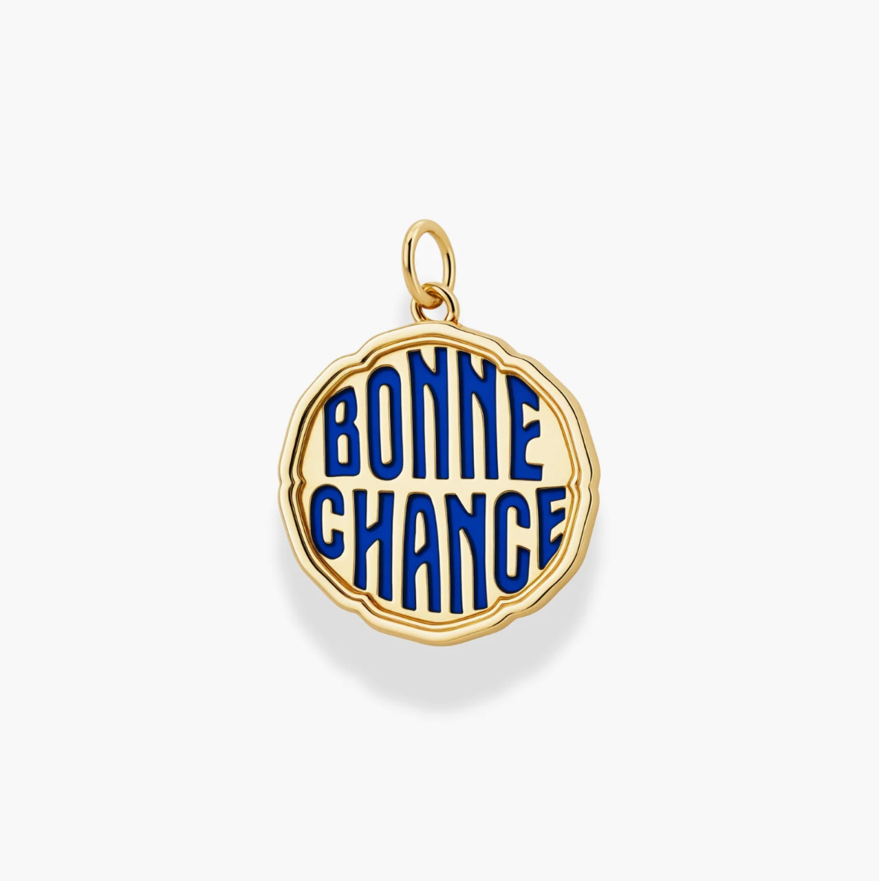 Gold pendant with blue 'Bonne Chance' text on a white background