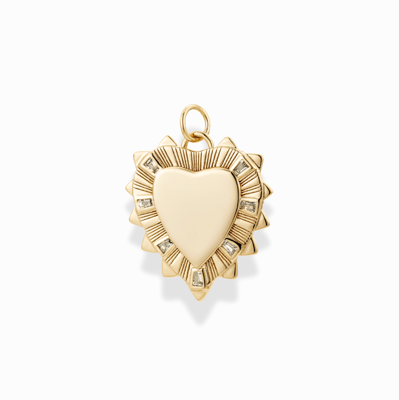 Gold heart-shaped pendant with CZ accents on a white background