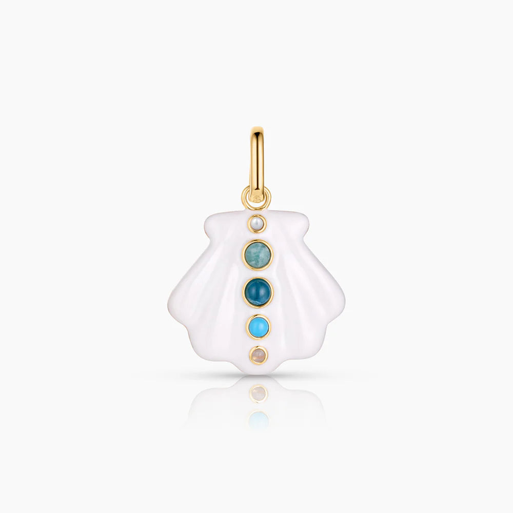 Gold pendant with three turquoise stones on a white background