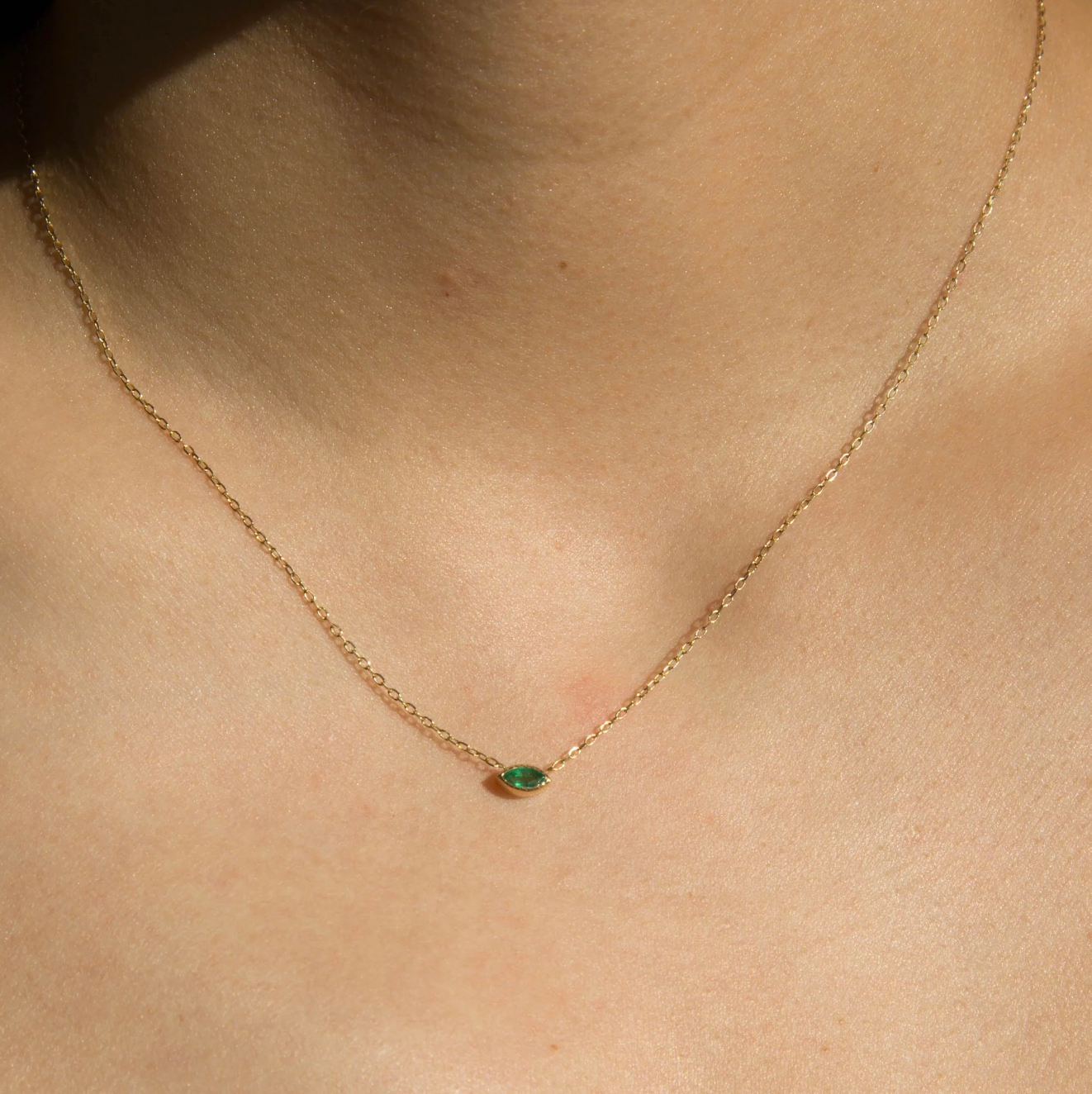 The Marquise Emerald Necklace is one of our new favorite layering necklaces. Just a small but vibrant pop of color. It's fresh, it's elegant and it's stunning.