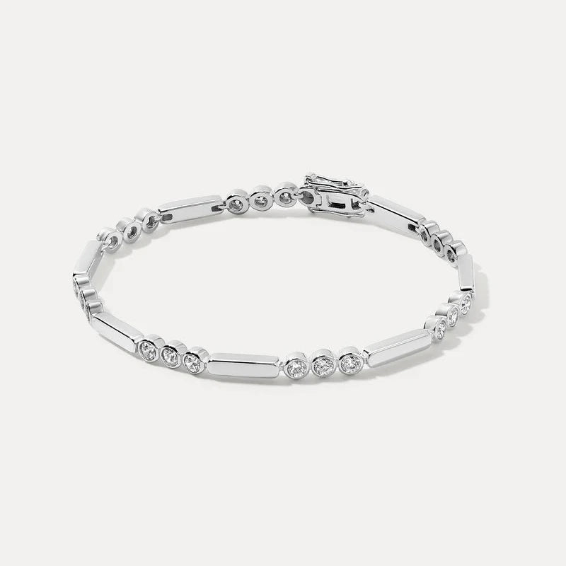 Silver bracelet with small diamonds on a white background