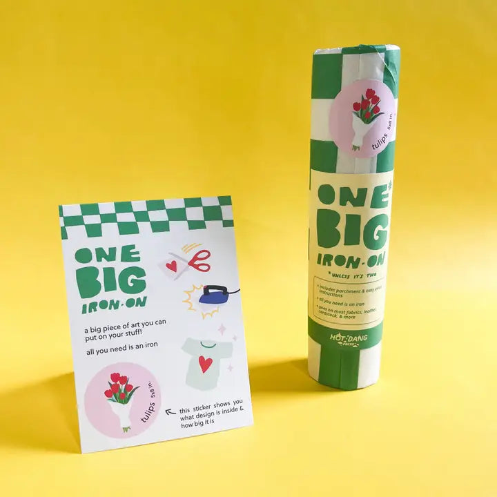 Roll of 'One Big Iron-On' with packaging on a yellow background