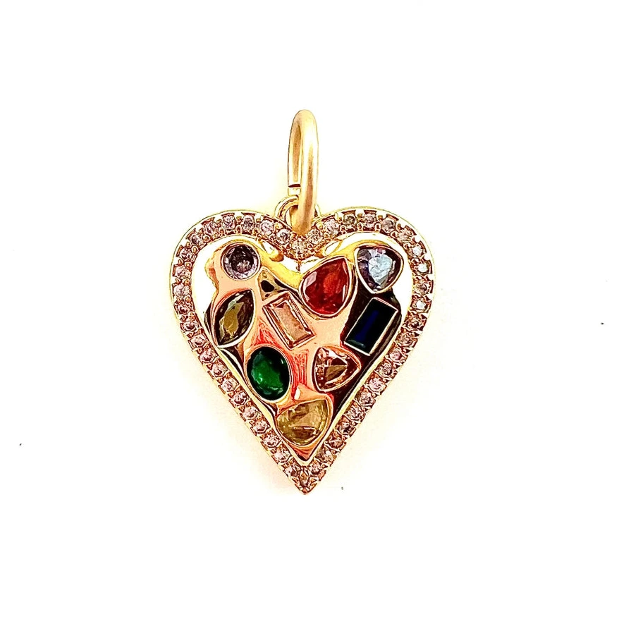 a gold charm with rainbow inlay stones on a white background