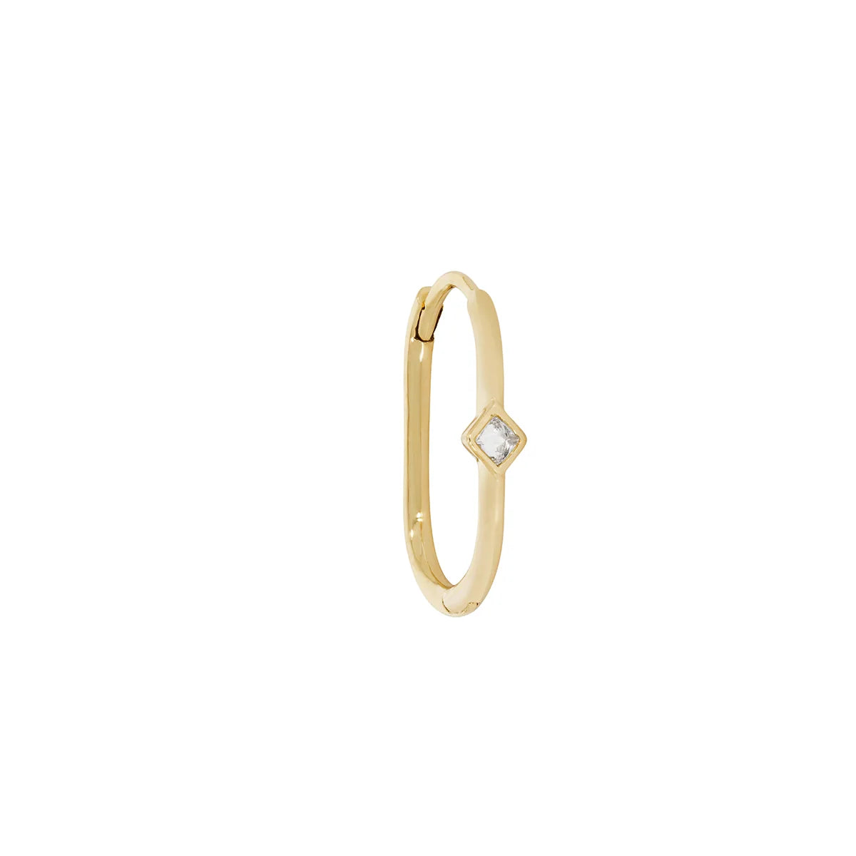 an oval shaped gold hoop earring with a hinge back closure and a square bezel set white diamond over a white background