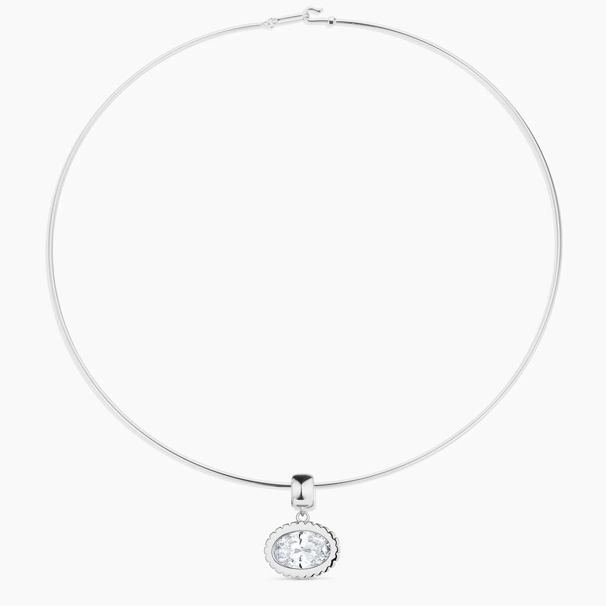 Silver necklace with a round pendant on a white background