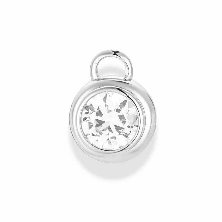 Silver pendant with a clear gemstone on a white background